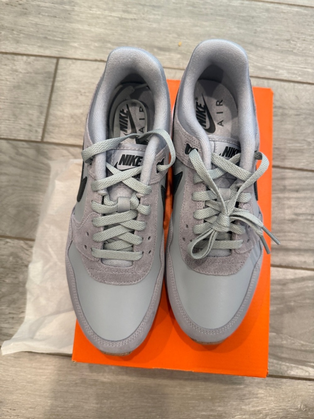 Nike Men's Air Sneakers in Light Gray with Black Swoosh